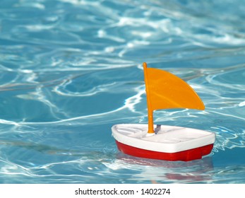 Toy Sailboat In A Swimming Pool