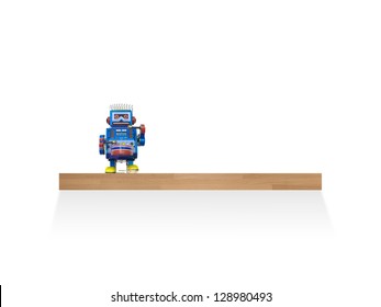 A Toy Shelf Isolated Against A White Wall