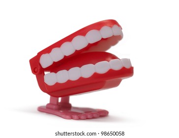 Toy teeth isolated on white background