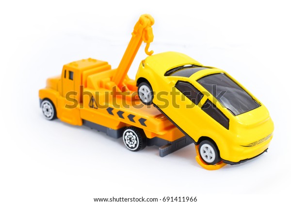 yellow tow truck toy