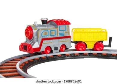 Toy Train With Freight Car Trolley On Railway Tracks, Isolated On White Background, Children's Railway With Steam Locomotives, Battery Powered Train