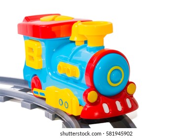 Toy train on rails. Bright colors. Railway.