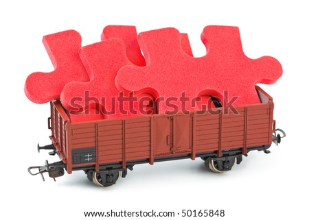 Toy train with puzzle isolated on white background