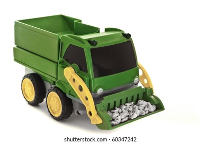 Toy Truck Carrying Rocks Isolated On White