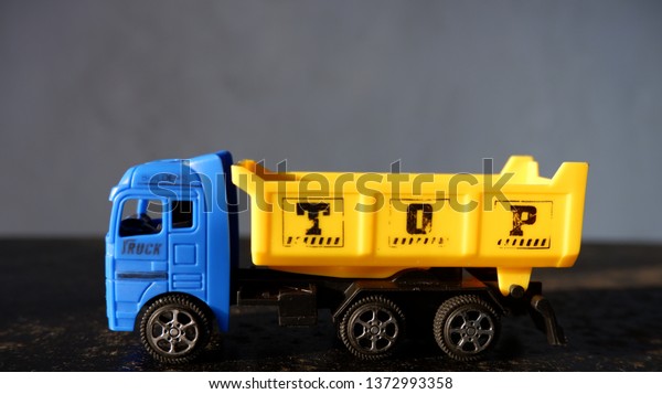 Toy trucks made from\
plastic