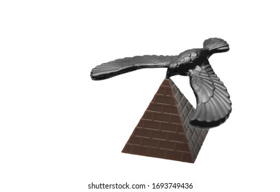 Toy With An Unusual Center Of Gravity: The Bird Balances At The Peak Of The Pyramid