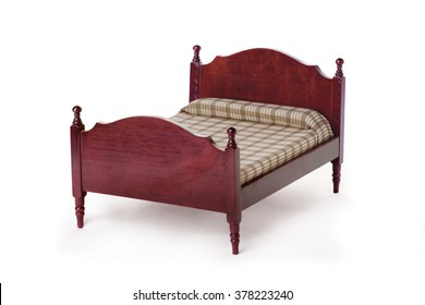 Toy Wooden Antique Bed On A White Background