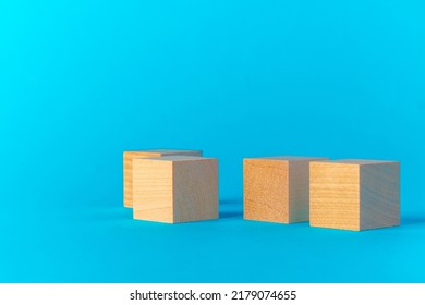 Toy wooden blocks on blue background front view - Shutterstock ID 2179074655