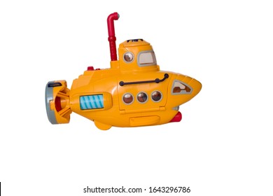 Toy yellow submarine on a white background