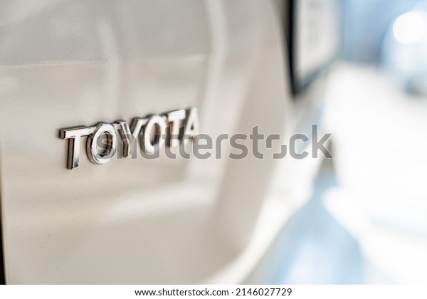 the Toyota inscription on the car. purchase
and sale of new cars in the salon. official dealership. Russia,
Rostov-on-Don, 04.04.2022