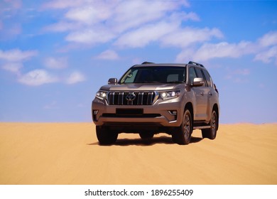 Toyota Land Cruiser Prado standing in the middle of the desert 17.01.2021. Walvis Bay, Namibia 