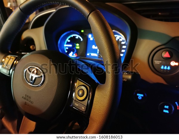 Toyota Yaris\
hybrid, interior view of the car from the inside, steering wheel\
and dashboard. Prague, January\
2020