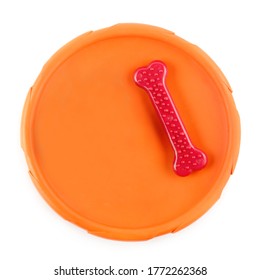 Toys For A Dog: Frisbee Disc And Chewing Bone Isolated On A White Background.