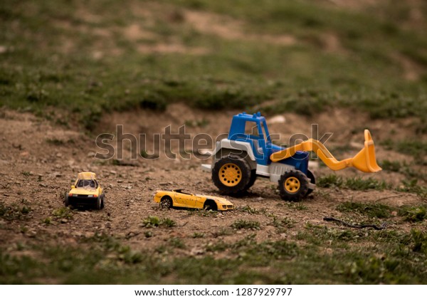 toys at outdoor. Toy
car and toy digger