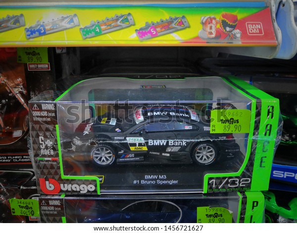 Toys R Us\
store,Kuala Lumpur ,Malaysia - July 2019 : Bmw toy car made by\
Burago display for sale in toy\
store.