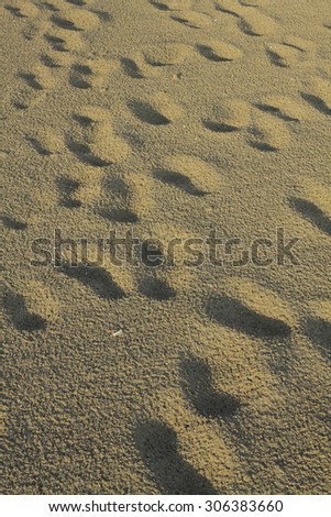 Trace of foot in sand