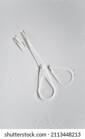 trace from scissors on a light texture. Abstract tool symbol