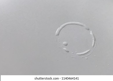 Trace water glass on white table with copy space 