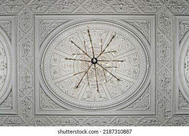 Tracery decorative ceiling with elegant retro chandelier - Shutterstock ID 2187310887