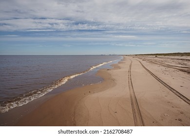 Traces From The Car Machine Sandy Beach Against The Sky. Off Road Extreme