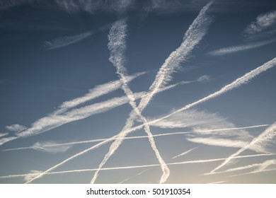 Traces of planes in the blue sky
