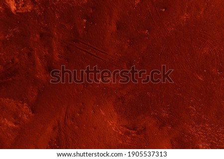 Traces of the rover on the surface of the planet. Fantastic martian landscape in rusty orange shades, Mars surface, Desert, Cliffs, sand. Alien landscape. Red planet mars.
