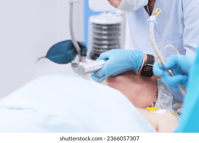 Tracheal intubation. An elderly man before surgery. Preparation for anesthesia. Introduction of breathing tube. Modern medicine. - Shutterstock ID 2366057307
