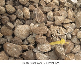 Track ballast is the material which forms the trackbed upon which railroad ties 