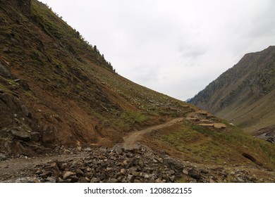Track passing through between the big mountains