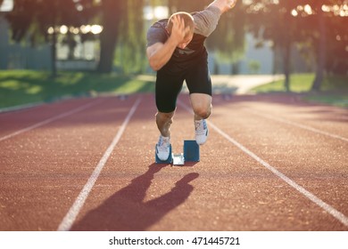 Track runner in starting position.