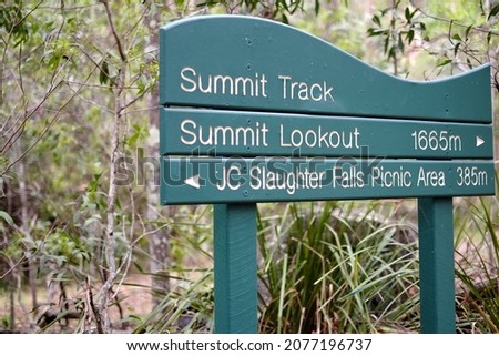 Track signage, the picnic sites at J C Slaughter Falls are located on Sir Samuel Griffith Drive in Mt Coot-tha. 