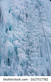 Track For Winter Climbing. Ice Wall With Safety Ropes.