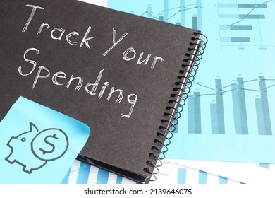 Track Your Spending Is Shown On A Photo Using The Text