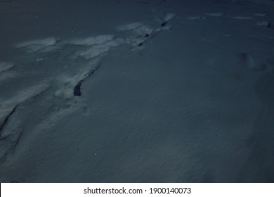 Tracks In The Snow At Night