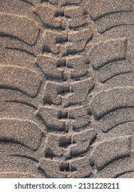 The tracks,wheel prints in sand at beach from horse-drawn carriages, jeeps and quad bikes
