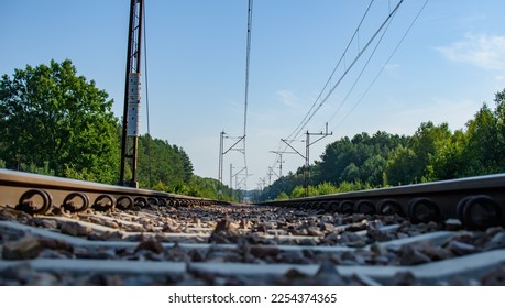 Trackway photographed from a very low perspective railroad tracks - Shutterstock ID 2254374365