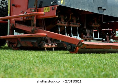 Tractor Aerating A Football Field.