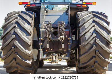 Tractor for farm work, modern agricultural transport working in the field, modern tractor close-up - Shutterstock ID 1122720785