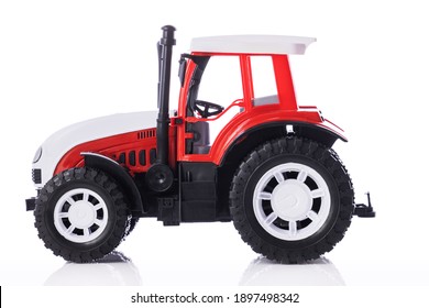 Tractor, kids toy isolated on white background