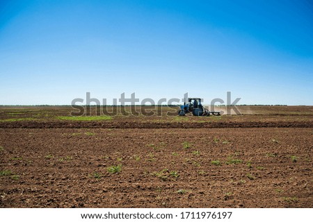 Similar – Image, Stock Photo Tractor plowing field