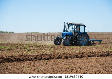 Similar – Image, Stock Photo Tractor plowing field