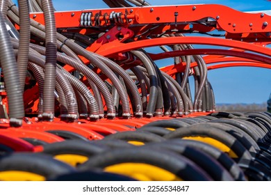 Tractor plows the field, plowed land, harvest 2023. 
Details and knots of tractors close-up. - Shutterstock ID 2256534847