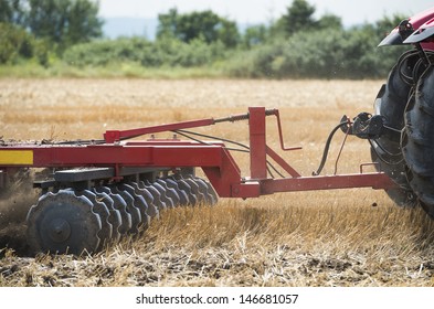 Tractor preparation the stubble field - Shutterstock ID 146681057