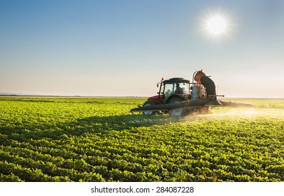 Tractor Spraying Soybean Field