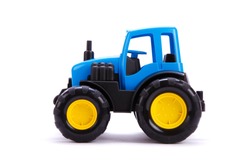 Tractor. Toy For Children. Toy Tractor On White Background.