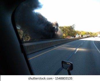 Tractor Trailer Crash With Smoke And Firetruck