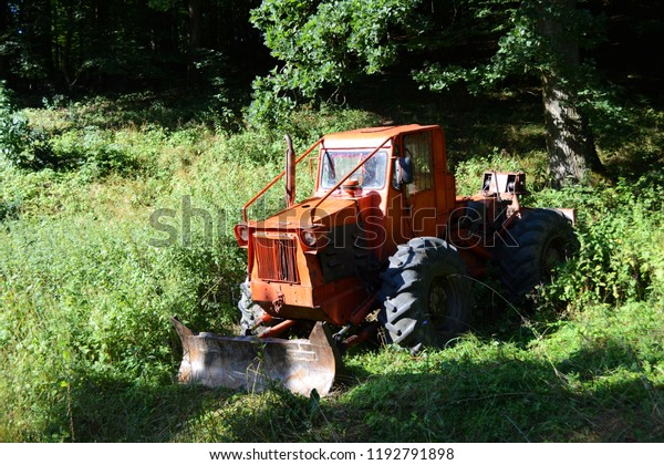 Tractor used in the woods for bringing down the\
timber of the mountain