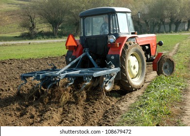 Tractor at work on a field.