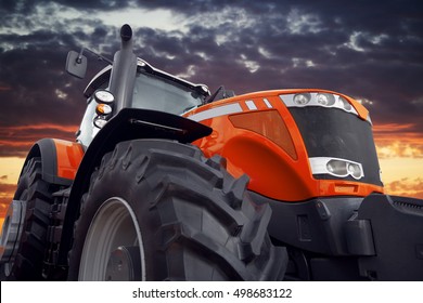 Tractor working on the farm, a modern agricultural transport, a farmer working in the field, tractor at sunset, modern tractor closeup - Shutterstock ID 498683122
