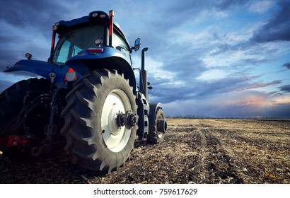 Tractor Working On The Farm, A Modern Agricultural Transport, A Farmer Working In The Field, Tractor At Sunset, Fertile Land, Modern Tractor Closeup, Cultivation Of Land